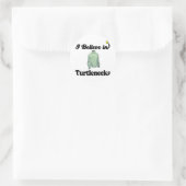 ik geloof in de turbulentie ronde sticker (Tas)