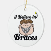 ik geloof tussen haakjes keramisch ornament (Links)