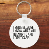 Ik glimlach omdat ik dingen ken sleutelhanger (Voorkant)