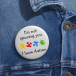 Ik heb Autisme Puzzles Ronde Button 5,7 Cm<br><div class="desc">Kleurrijke puzzelstukjes met een boodschap voor je campagnes voor autisme. Dit ontwerp heeft kleurrijke puzzelstukken in groen rood geel en blauw met een bericht dat zegt: "Ik negeer je niet. Ik heb autisme"</div>