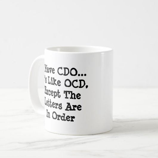 Ik heb CDO - zoals OCD, behalve dat letters in ord Koffiemok (Voorkant links)