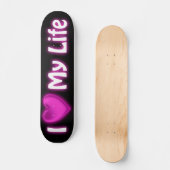 Ik hoor mijn leven zwart en warm roze skateboard (Voorkant)