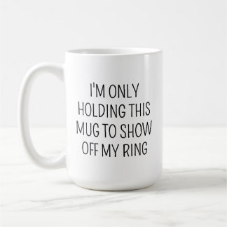 IK HOU DIT KOPJE ALLEEN MAAR VAST OM MIJN RING TE KOFFIEMOK
