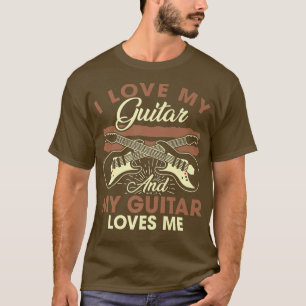 Ik hou van mijn gitaar en van mijn gitaar... ...ik t-shirt
