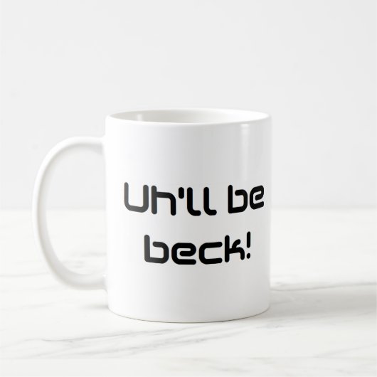 Ik kom terug. koffiemok (Links)