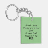 "Ik laat geen voetafdrukken achter in het zand" Sleutelhanger (Voorkant Links)