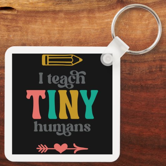 Ik leer kleine mensen sleutelhanger (Achterkant)