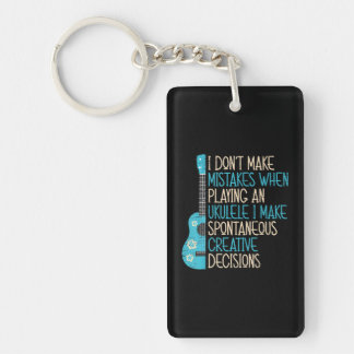 Ik maak geen fouten bij het spelen van een ukulele sleutelhanger