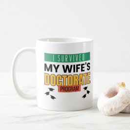 Ik overleefde de doctoraatsopleiding van mijn vrou koffiemok