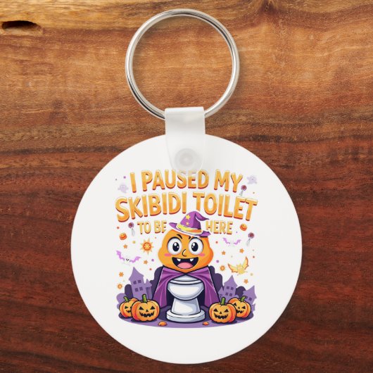 Ik pauzeerde mijn skibidi toilet om hier grappig t sleutelhanger (Voorkant)
