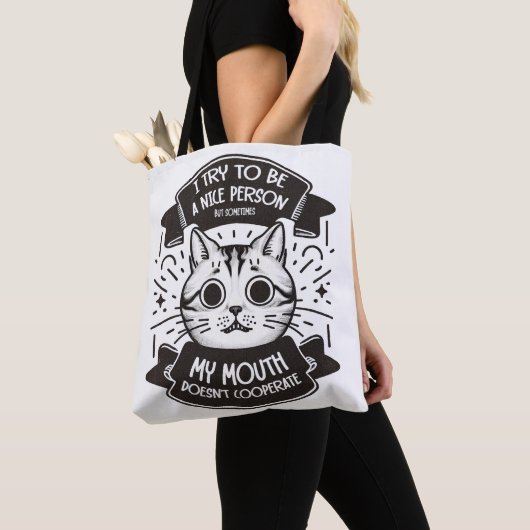 Ik probeer een aardige persoon te worden tote bag (Dichtbij)