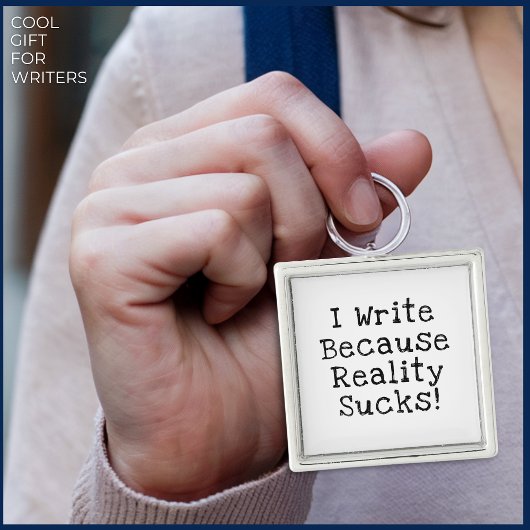 Ik schrijf omdat de werkelijkheid klote is met een sleutelhanger