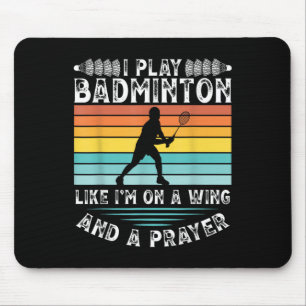 Ik speel badminton zoals ik op een vleugel en een  muismat