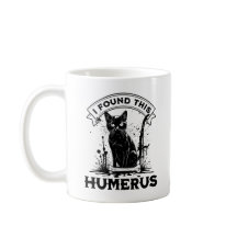 Ik vond een humerus zwarte kat met menselijk bot