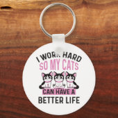 Ik werk hard zodat mijn katten een beter leven kun sleutelhanger (Voorkant)
