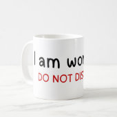 Ik werk niet storen koffiemok (Voorkant links)