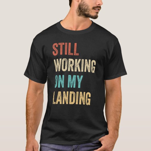 Ik werk nog steeds aan mijn landingsboogfractuur 5 t-shirt (Voorkant)