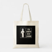 Ik werk nog steeds aan mijn landingsbroekarm. tote bag (Achterkant)