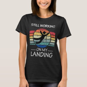 Ik werk nog steeds aan mijn landingsletsel, gebrok t-shirt