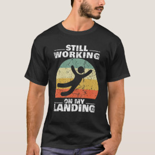 Ik werk nog steeds aan mijn landingsletsel, gebrok t-shirt