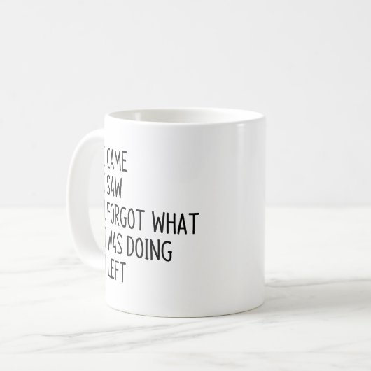 Ik zag dat ik vergat wat ik aan het doen was koffiemok (Voorkant links)