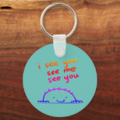Ik zie je, zie me, zie je sleutelhanger (Achterkant)