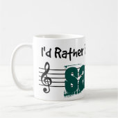 Ik zou liever m'n sarod spelen. koffiemok (Links)