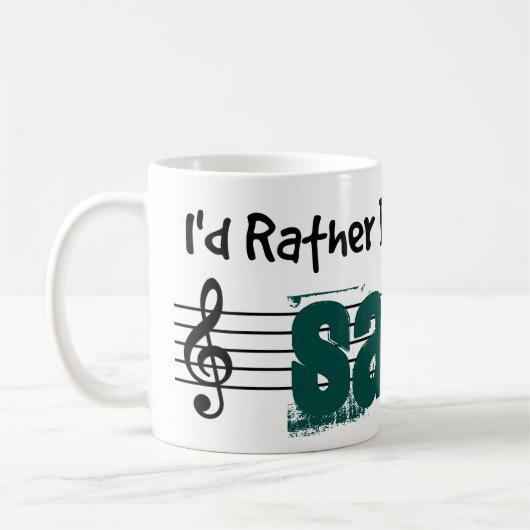 Ik zou liever m'n sarod spelen. koffiemok (Links)