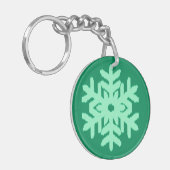 Ikat Snowflake - Pine- en muntgroen Sleutelhanger (Voorkant Links)