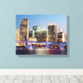 Illuminated skyline of downtown Miami at dusk Canvas Afdruk (Insitu (Houten vloer))