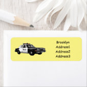 Illustratie cartoon politieauto etiket (Insitu)