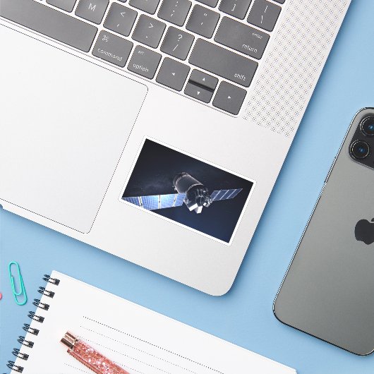 Illustratie van de Dragon XL ruimtesonde. Sticker (Laptop met iPhone)