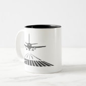 Illustratie van de start van de baan van het vlieg tweekleurige koffiemok (Voorkant links)