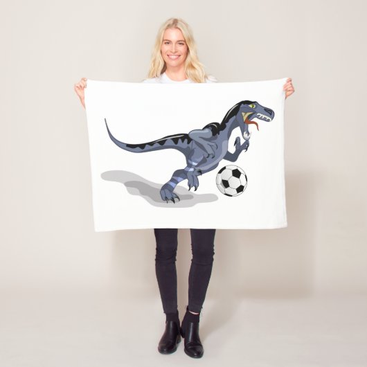 Illustratie van een raptor dinosaurus die voetbal  fleece deken (In situ)