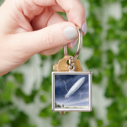 Illustratie van het luchtschip dat wordt getroffen sleutelhanger (Hand)