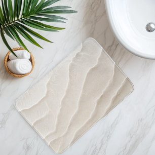Imitatie strandsand onder helder water badmat
