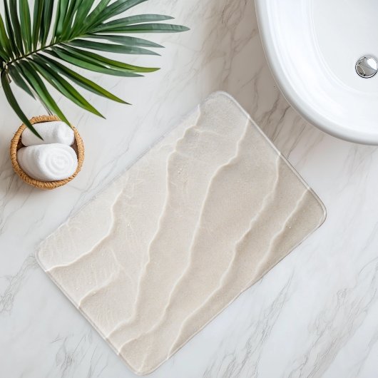 Imitatie strandsand onder helder water badmat