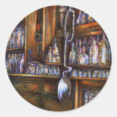 impliciet begrepen ronde sticker (Voorkant)