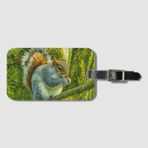 Impressionistische eekhoorn in bosgebladerte bagagelabel