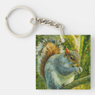 Impressionistische eekhoorn in bosgebladerte sleutelhanger