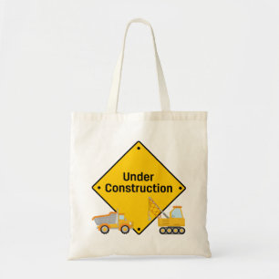 In aanbouw met vrachtwagens tote bag