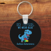 In april Draag we Blue Autism Awareness Month Dino Sleutelhanger (Voorkant)