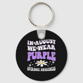 In augustus Draag we Paarse overdosis bewustzijn R Sleutelhanger (Voorkant)
