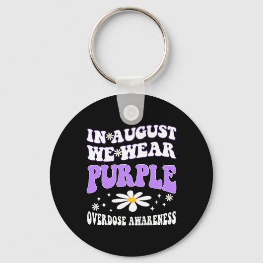 In augustus Draag we Paarse overdosis bewustzijn R Sleutelhanger (Achterkant)