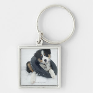 in de binnenbuis in de sneeuw sleutelhanger