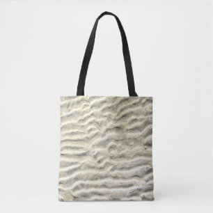 In de zand getekend op een tote bag