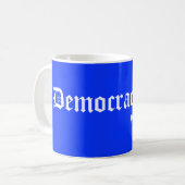 In democratie vertrouwen we, blauw koffiemok (Voorkant links)