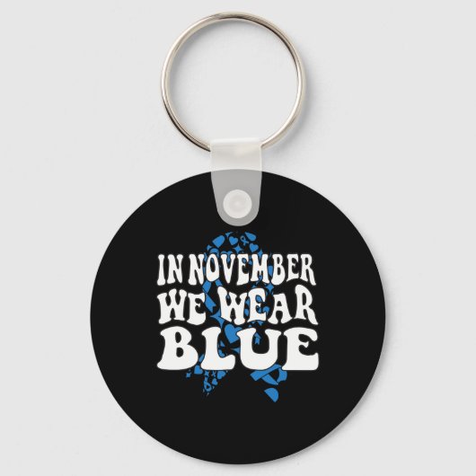 In november Draag we het bewustzijn van de blauwe Sleutelhanger (Voorkant)