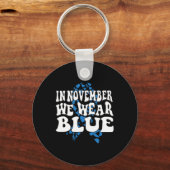 In november Draag we het bewustzijn van de blauwe Sleutelhanger (Voorkant)
