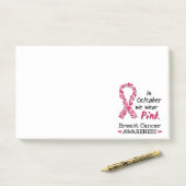 In oktober draag we roze borstkankerbewustzijn post-it® notes (Op bureau)
